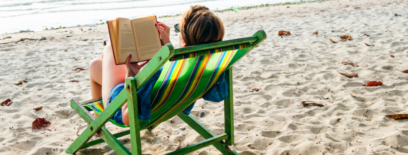 Reading book on the beach